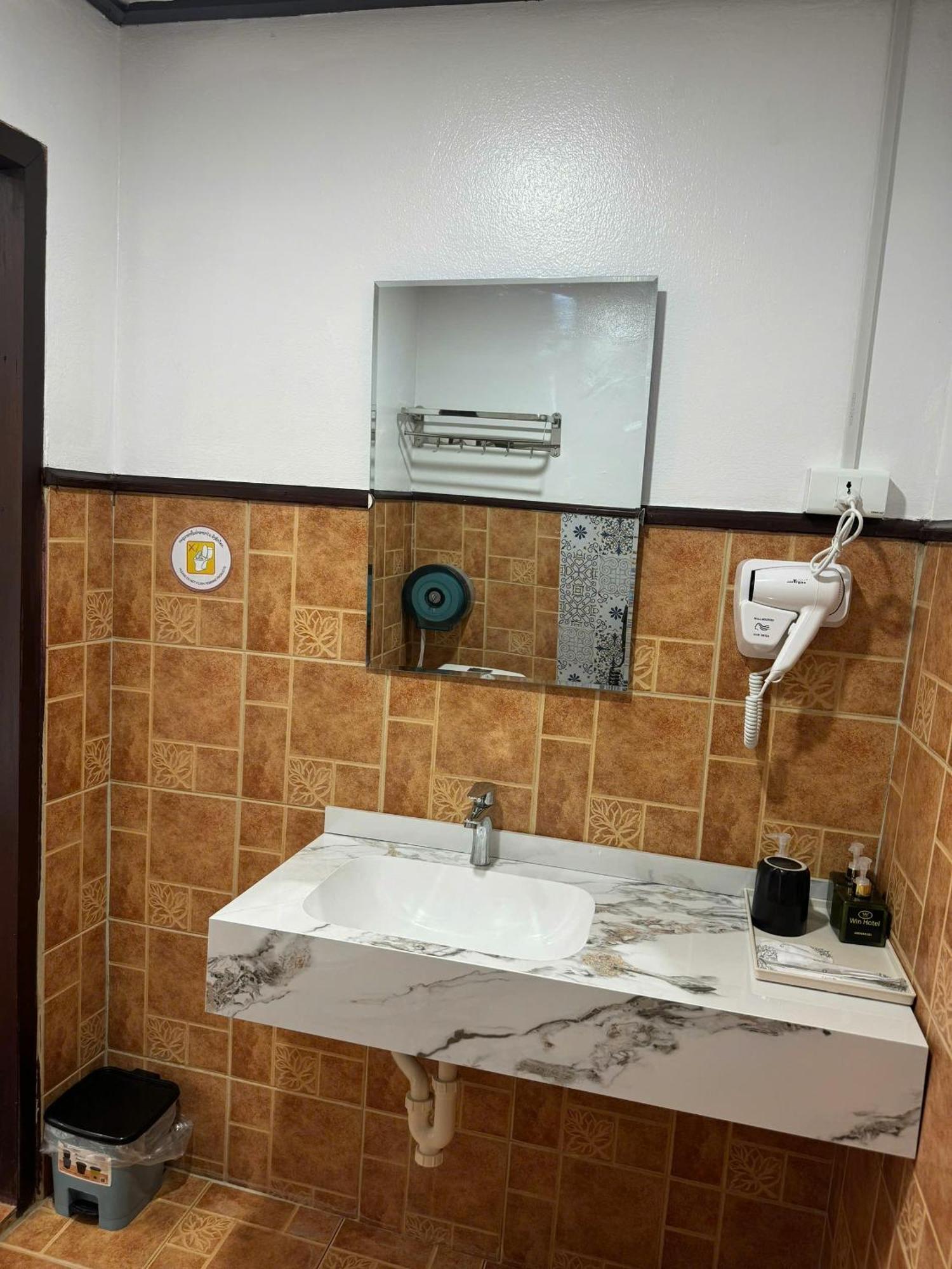 Win Hotel Vang Vieng Quarto foto